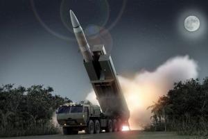 OpFires' variable-range second-stage motor enables payloads to defeat targets across the medium-range spectrum. Its launcher assembly loads onto fielded transportation vehicles with the push of a button.(Lockheed Martin Artist Concept)